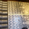 Zdjęcie z Tajlandii - stópki od spodu z ciekawymi inskrypcjami wykonanymi z macicy perłowej