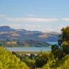 Zdjęcie z Nowej Zelandii - W dole McGregor Bay i dachy Coromandel