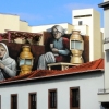 Zdjęcie z Portugalii - Na jednej z ulic zauważamy taki uroczy mural, pokazujący maderskie hafciarki.