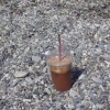 Zdjęcie z Grecji - Nie ma to jak zimne Frappe na greckiej plaży.