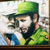 Zdjęcie z Kuby - Ernest z Fidelem spoglądają ze ściany knajpki...