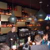 Zdjęcie z Polski - ja zapatrzona w te plakaty, a tymczasem drinki nam stygną :)) 