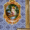 Zdjęcie z Portugalii - typowe dla Portugalii wizerunki świętych na fasadach domów pokrytych ceramiką